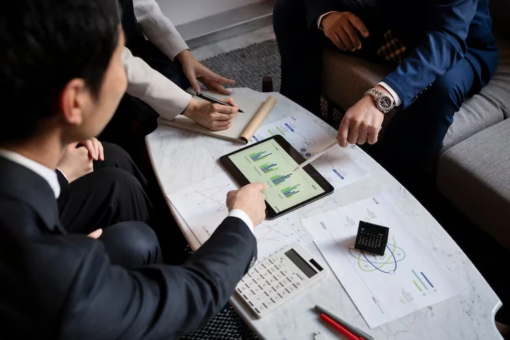 Trusted multi-property portfolio bookkeeping solutions team reviewing reports