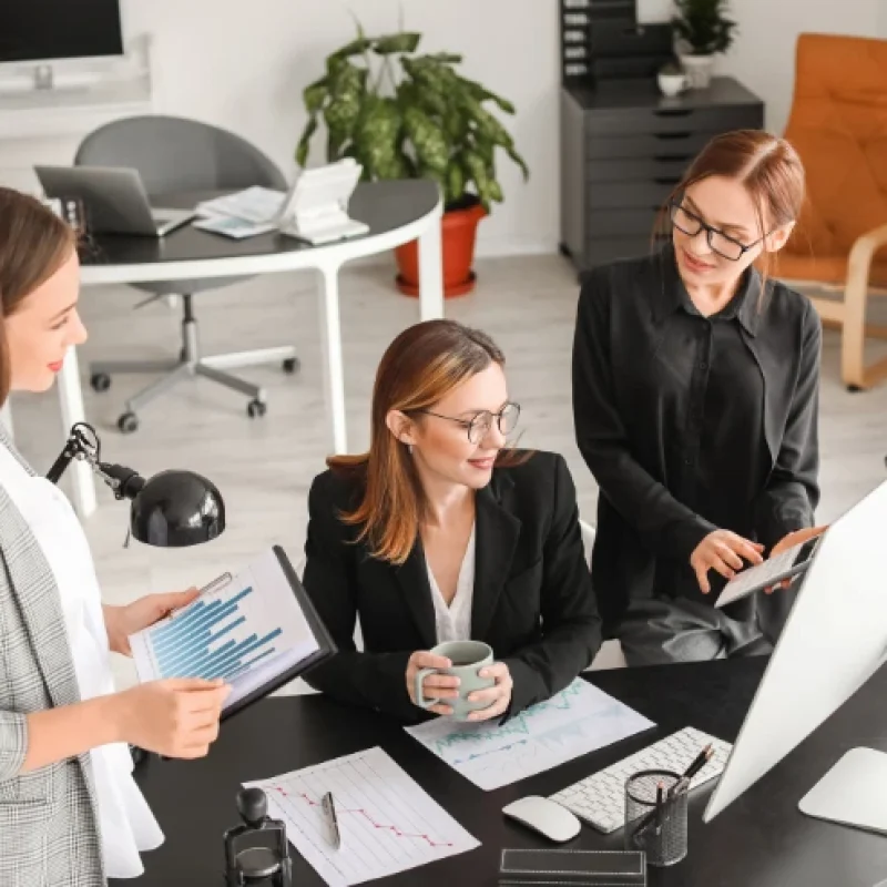team of accountants assisting dental practice with finances