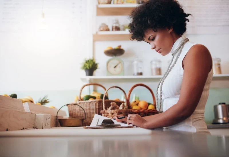 female business owner reviewing financial documents