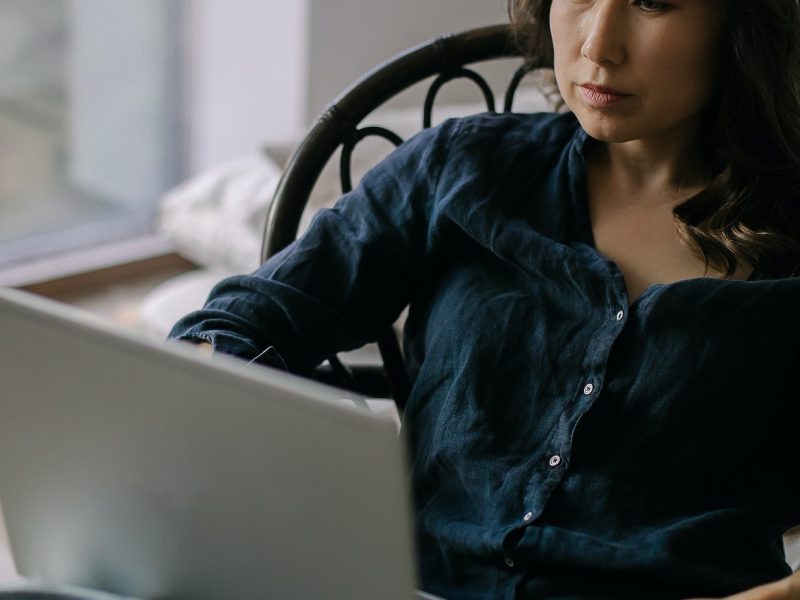 Female freelancer working remotely on laptop from home Female freelancer working remotely on laptop from home, Self Assessment Accountant