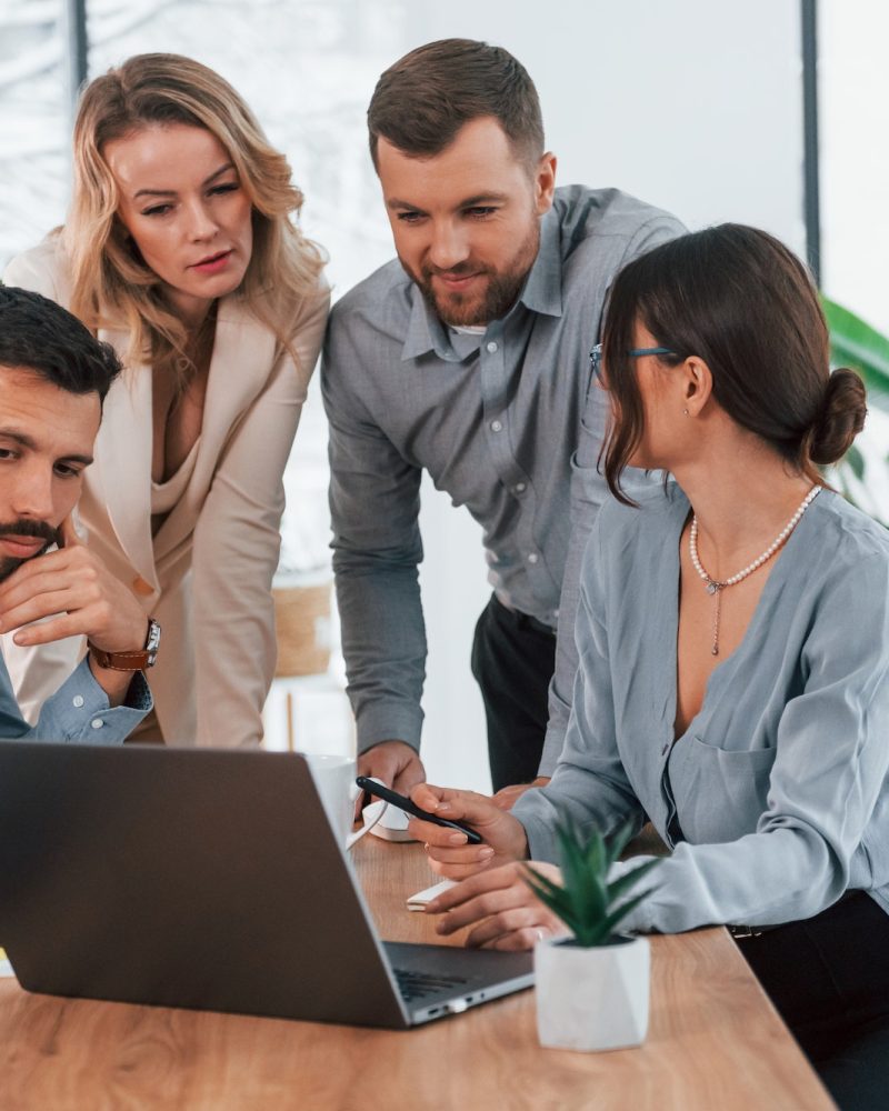 Pearl Lemon Accountants Accountants and Bookkeepers looking at the laptop screen in the office