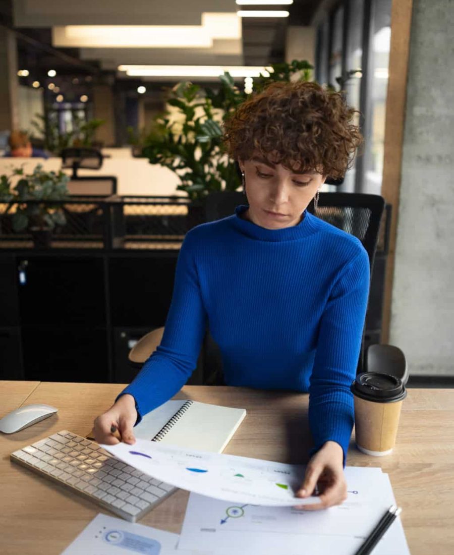 person-office-analyzing-checking-finance-graphs