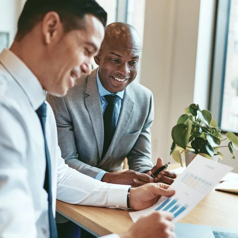 Expert Forensic Accounting Services in London | Pearl Lemon Accountants Professionals discussing financial reports and analysis