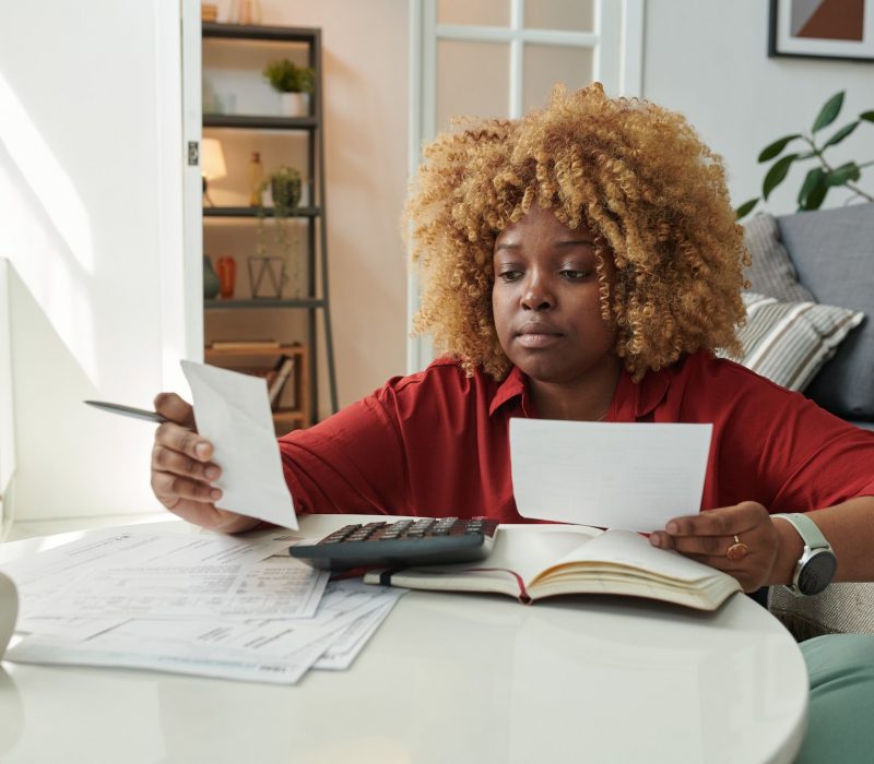 Woman doing finances at home