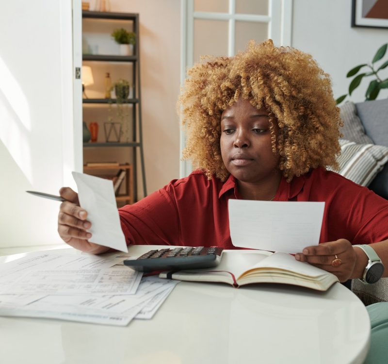 Woman doing finances at home